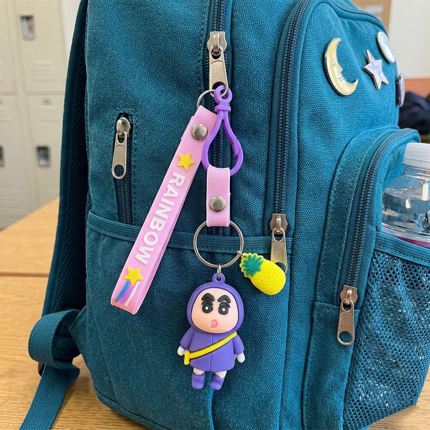 colorful cartoon doll keychain with pineapple charm